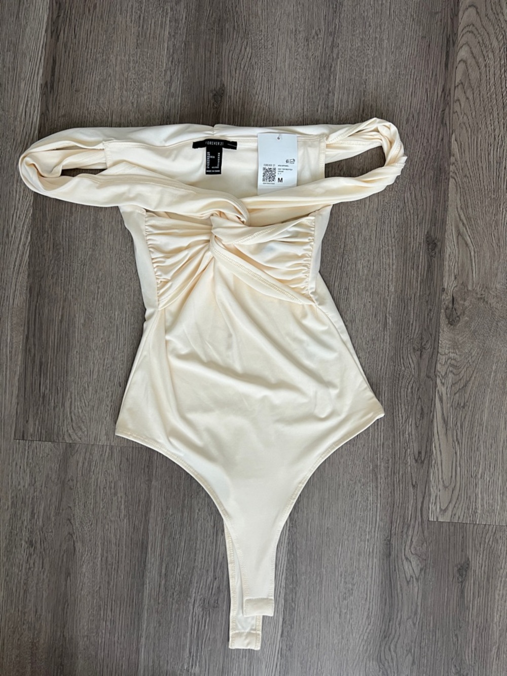Cream Off the shoulder bodysuit with Twist Front